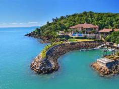 	Airlie Beach QLD  Situated perfectly in this coastal paradise is arguably one of Australia’s premier waterfront properties with spectacular turquoise Coral Sea waters on one side and untouched national park on the other. Mandalay House enjoys the very best of the Whitsundays. Classic architecture complements perfect views on a scale that will simply amaze. Nowhere does the attention to detail lapse as this home has been built as a labour of love, a dream realised. New to the market, Mandalay House presents an unrivalled real estate and lifestyle investment opportunity. Features include: - 4,200 sqm north-west facing block adjoining National Park with uninterrupted ocean & island views - Coordinates 20°15’18.24 S – 148°44’01.03 E - The house boasts a total of 2,649 sq metres - 6 spacious king size bedrooms with marble ensuites - 9 bathrooms including ensuites - Palatial master bedroom covers 144 sqm with lounge room & separate 52 sqm walk in dressing room - Formal dining and lounge rooms - Ocean front pavilion with dining for 14, marble bar & wood-fired pizza oven - Large wood panelled office with separate secretarial space & its own bathroom, media & library rooms - Large kitchen with adjoining casual dining room - Maid’s room, butler’s pantry & separate caretaker’s cottage - Large laundry and sewing room - Studio with court yard - Climate controlled cellar with dining for 12 - Cinema, gymnasium and pool rooms - Lift with timber panel and auto doors for all floors. - 6 car garaging - 240 volt Generator for emergency power back up - Desalination water maker - Underground rain water storage for 451,000 lts - Large plant and storage rooms plus work shop area - Multi zoned commercial air conditioning throughout - C-Bus smart home automation system - Monitored security with CC TV and 24 hr recording - All-weather rock wall marina with 24 meter berth, 2 jet ski docks & boat shed - Private heli-pad 10 minutes to Hamilton Island Jet airport Whitsunday Islands, nearby attractions and facilities:  - Dent Island 18 hole golf course overlooks the entire Whitsunday island group - Hayman Island contains a great selection of fine dining, duty free shopping, private bars & spas - Hamilton Island hosts 6 star hotels, fine dining restaurants, shops, bars, marina, golf course, spas, night clubs and a school. 