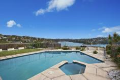 32 Bay Street, Mosman NSW This luxuriously renovated family home boasts panoramic views across Quakers Hat Bay and Middle Harbour and offers a private whisper quiet lifestyle. This property is a rare combination of a family friendly layout, superb entertaining possibilities and world class views. Features include: Stylish renovated interiors, large 915 m2 block, landscaped front & rear gardens Vast living areas flowing to covered entertaining with stunning back drop Child friendly garden/lawn and swimming pool all visible from kitchen & living Gourmet integrated Caesar stone kitchen with 2 bosch ovens Superb master suite with luxurious ensuite, walk in robes, stunning views Hardwood and Travertine floors, stained glass, LED downlights, Ducted air-conditioning  Double automatic garage with internal access, additional storage, alarm Moments to shops, schools, buses and scenic bayside reserves A fabulous home for families of all ages with a spectacular middle harbour backdrop. A must see. 