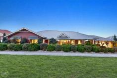 DOREEN
26 Overland Drive
Surrounded By Quality

Spreading wide across its 877m2 allotment (approx), this as new family home has been brilliantly executed to the highest standards, set in a premium pocket, it introduces four bedrooms, two bathrooms and a study complementing generously proportioned indoor-outdoor living and entertaining options. Sophisticated, elegant and refined, designer detail is evident throughout the home with highly polished timber floors, newly laid carpet, quality drapery, ornate cornice, profiled skirting boards and timeless colors. With its stone tops, solid timber cabinetry, state of the art appliances and super efficient pantry, the kitchen is as much a showpiece within the open plan living, as it is a culinary hub. Designed with seamless indoor-outdoor entertaining in mind, both the formal and casual living flow directly to an enormous decked precinct with fitted cafe blinds and set above landscaped gardens, offering views to distant hills, it provides comfort and privacy all year round.With the bus virtually at the door and all the lifestyle benefits of Laurimar within easy reach, along with ducted heating, cooling and vacuum heading a long list of quality inclusions, this will be the perfect blend of luxury, lifestyle and location for years to come. 

Features Include
Land Size: 	 877 m2
Features: 	 Alarm System, Built In Robes, Deck, Dishwasher, Ducted Heating, Ensuite, Floorboards, Remote Garage & Shed