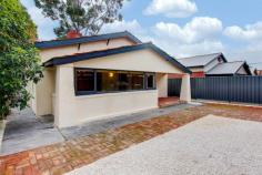  1 Ascot Avenue Dulwich SA 5065 
 
Located in one of Adelaide's premium suburbs, we offer you a highly prized bungalow just five minutes' walk to the parklands. 
 
Ownership care is apparent with a full recent paint out and yard makeover. 
 
Enter via the sunroom which leads to the generous living room which 
boosts beautiful Jarrah floors, ornate ceiling and a cosy gas fireplace.
 There are three well located, large bedrooms. 
 
The functional Kitchen/dining room, bathroom and laundry (with 2nd w.c.)
 are located at the rear with a second sunroom and storeroom. 
 
Solid brick, high ceilings and jarrah floors throughout are very 
desirable features. The simple floorplan works well. You may choose to 
extend and renovate further after settling in. 
 
Gas fire place warms you in winter. Evaporative ducted air cond cools you in summer. 
 
Front and rear yards are low maintenance, paving, white stone and slate.
 Corner block position with 2 crossovers allows 4 cars off-street with 
garage. 
 
The bungalow is situated on 510m2 of very manageable land and will 
attract multiple buyer types to view. Surrounded by similar homes of 
this era. 
 
 Located in one of Adelaide's premium suburbs, we offer you a highly prized bungalow just five minutes' walk to the parklands. Ownership care is apparent with a full recent paint out and yard makeover. Enter
 via the sunroom which leads to the generous living room which boosts 
beautiful Jarrah floors, ornate ceiling and a cosy gas fireplace. There 
are three well located, large bedrooms. The functional 
Kitchen/dining room, bathroom and laundry (with 2nd w.c.) are located at
 the rear with a second sunroom and storeroom. Solid brick, high 
ceilings and jarrah floors throughout are very desirable features. The 
simple floorplan works well. You may choose to extend and renovate 
further after settling in. Gas fire place warms you in winter. Evaporative ducted air cond cools you in summer. Front
 and rear yards are low maintenance, paving, white stone and slate. 
Corner block position with 2 crossovers allows 4 cars off-street with 
garage. The bungalow is situated on 510m2 of very manageable 
land and will attract multiple buyer types to view. Surrounded by 
similar homes of this era. A desirable mid-size home suitable for
 first home buyers, downsizers or rent ready investors. With the high 
level of presentation, buyers will be tempted to just move in and enjoy.
 - See more at: 
http://vennmillar.harcourts.com.au/Property/570493/SCL7556/1-Ascot-Avenue#sthash.s3E09eov.dpuf 