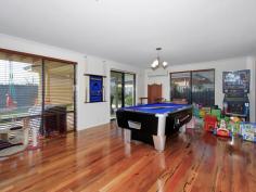  21 Zanzibar Loop, Aveley WA 6069 The kitchen is every chefs dream with transformation granite bench tops, double sink, stainless steel appliances including rangehood, 900mm cooker,dishwasher recess, big utility cabinet, microwave recess, overhead cupboards and an abundance of cupboards, pot drawers and benchtoips perfect for the master chef. This area is centrally located so it looks over the dining and family room. The dining area is very spacious and will accommodate a 10 – 12 seater dining table perfect for family and friends. A beautiful built in bar in the family area is perfect for entertaining with its own sink and perfect to sit up and relax or walk through sliding doors out to the alfresco area under the main roof. French doors separate the family area from the Theatre room which is very large and has r/c a/c. The main bedroom is huge with a large walk in robe and ensuite with double vanity, big shower, heater lamp, tiled to the ceiling and toilet. Laundry has built in cupboards and separate powder room. Walk up the stairs to a very large family area with marri flooring, rake ceilings, and sliding doors out to the balcony area. Bedrooms 2,3 are double in size and have built in 3 door robes. Bedroom 4 & 5 also are double in size double door robes and sliding doors out to the balcony with views to the reserve and beyond.. 3 Car garage. A Huge powered workshop at the back with access through from the garage. Shade sails, fully reticulated gardens, Storage under stairs, ducted air conditioning upstairs. Viewing this lovely home is a must call Donna to view. 