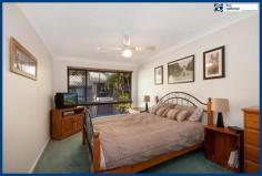 If you're looking for a well presented, low maintenance townhouse as your first home or investment, this is the one for you! Located
 in an elevated position in a complex of only 25, featuring onsite 
managers and well maintained grounds with tropical gardens and pool just
 a few minutes' walk from central Mudgeeraba shops, cafes, transport and schools. Features include: * split level style with ground floor living * 3 good sized bedrooms with built-in wardrobes (the master with ensuite on its own level, second with it's own balcony * bathroom with bath * separate laundry with built-ins * generous open plan living / dining area with easy-care timber-look flooring and split system air conditioning * light filled kitchen with dishwasher and breakfast bar * security screens and doors * single lock up garage with auto door * extremely low maintenance property * great tenants currently paying $360 per week * conveniently located next to visitor parking Fabulous
 for both owner occupiers and investors, this townhouse is located just 3
 minutes drive to the M1 Motorway, Robina Town Centre, Railway Station 
& Hospital. Motivated vendors want this townhouse sold!   