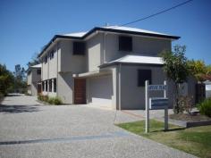 1/9 Mill Street, Landsborough YOU WILL NOT FIND A BETTER POSITION THAN THIS. Only 50 metres to the 
supermarket, cafes & hotel,100 metres to the railway station. This 
modern 3 b'room unit 
has a big kitchen with dishwasher, pantry and good bench space, tiled 
airconditioned living area, all the bedrooms have ceiling fans and 
built-ins, the master has an ensuite and there is a bath and shower in 
the guest bedroom. This spacious unit has three toilets one being in the
 powder room on ground level. The living area opens out onto the private
 fenced courtyard and there is a water tank as well as town water. An 
added bonus is a large remote control DOUBLE garage. This unit is in 
small complex of only 5 with low body corporate fees. 