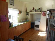  23 Stanton Street Stanthorpe Qld 4380 OPEN THIS SAT (02 Aug) 10 -10.45am. Wow! Check out this price for a property in town! House is rendered with iron roof and brick stumps. 2 bedrooms, small sunroom with effective wood heater, lounge/dining area with easy layout kitchen, bathroom, sep laundry and ideal covered rear deck overlooking family size grounds - good size -1062m2 with garden shed, fenced.  Car accommodation and 16 solar panels feeding back to grid. Just a stroll to nearby local shop and easy quick zip to main street and schools! Seller wants offers NOW! Asking just $175,000..... very little left at this price!  