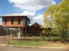  2 Quondong Street Kununurra WA 6743 The Seller describes this 4 bedroom, 2 bathroom property as an 'Argyle Townhouse', with loft inspired first floor is dedicated to a massive master suite which creates a true adult / personal / private / parent's retreat utilising the entire first floor area.  Externally, a tasteful palette of mixed materials including steel and western red cedar cladding features show the attention to design undertaken by the builder.  Internally, has been spared no differently with slate tiling, With external having a tasteful mixture of steel and cedar cladding, Merbau hardwood stairs, polished timber feature ceiling, lustrous cabinetry throughout. The two story design makes efficient use of the land size delivering an easy care lot with ample parking and outdoor entertaining spaces directly accessible from the indoor living areas.  The list of features is endless 6m x 4m spacious master bedroom with separate WIR, quality stainless steel appliances in the kitchen including induction stove, rangehood, dishwasher, overhead cupboards and island bench, 40sqm Alfresco features built-in BBQ alcove, polished aggregate flooring, ceiling fans and lighting, panasonic split system air conditioning, louvered windows (with security bars downstairs) & downlights throughout, plenty of storage space, security on all entry doors, fully reticulated and fenced, storage shed, double carport.  Offering an ultra stylish, modern and very unique style of Kimberley living. 