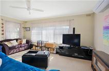 6/519 Drummond Street, Ballarat VIC 3350 Perfect Position $209,000 This front unit of 6 is set back from the road making it quiet, peaceful and as it is North facing, there is plenty of natural light. A slate floor sunroom is the way in to the home and is a heavenly environment for plants to thrive. The front door opens to a partitioned area that then takes you into the spacious lounge that has large windows, a gas heater, a ceiling fan and a split system. The dining and kitchen are accessed from the lounge. The kitchen has solid timber cupboards, a generous pantry and a gas stove. Both bedrooms have built in robes, exterior awnings and easily accommodate double beds. The central bathroom has a separate shower, bath and vanity. The laundry area has terrific storage and leads to the small paved L shape secure courtyard. This property has a single carport. Located on a bus route and within easy access to schools. 