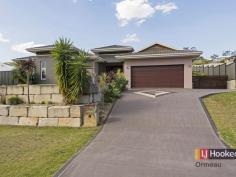  107 Ormeau Ridge Rd Ormeau Hills QLD 4208 OPEN HOME SATURDAY 12:00 - 12:30 PM 
 
The vendor has already moved on and would welcome an immediate sale on 
this Metricon home. The Adelphi 37 is an eye-catching, free flowing 
design. From the beautiful entry portico to the spacious master suite 
and separate kid's retreat, this home is especially for those looking 
for the ultimate in fine, spacious modern living. 
 
* Elevated, overlooking parklands with a private feel 
* Formal living and formal dining 
* Extra large family room 
* Separate kid's retreat area off 3rd and 4th bedrooms 
* Powder room opposite kid's retreat 
* Large master bedroom with a wall length built in robes enclosed by glass doors 
* Ensuite with oval spa bath, separate toilet, twin vanities and large shower with frameless pivot glass door 
* Study/5th Bedroom/Media Room 
* Spacious open kitchen with 40mm Caesarstone Quartz bench tops has a 
5-ring gas cooktop with stainless steel 900mm rangehood and oven 
* Stainless steel dishwasher, microwave and walk-in pantry 
* Security alarm 
* Formal dining and family room both lead out to the under-roof 
timber-floored Alfresco area with power points and stainless steel 
overhead fan 
* Huge 12 seater outdoor spa with covered thatched timber roof and pool fencing 
* 2 Telstra phone points and 2 TV points 
* Extra car space to the side / possible side access 
* Low maintenance yard 
* 5000 litre slimline water tank with pump 
* Natural gas connected for cooking and water heating 
 
This is the home in this upmarket estate that you have been waiting for! 
37sq on a 1001m2 block with 4 living areas - more than enough room for all the family. 
 
   
 
 Property Snapshot 
 
 
 
 Property Type: 
 Residential House 
 
 
 Construction: 
 Brick 
 
 
 Land Area: 
 1,001 m 2 
 
 
 Features: 
 
 Alfresco Area 
 Ceiling Fans 
 Dining Room 
 Dishwasher 
 Ducted Air Conditioning 
 Ensuite 
 Family Room 
 Fenced Back Yard 
 Gas Cook Top 
 Internal Access via Garage 
 Lounge 
 Powder Room 
 Security Screens 
 Security System 