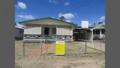  36 Hoffman St Roma QLD 4455 
 Easy To Maintain 4 Bedroom Home 
 4 Bedroom home. All bedrooms are 
carpeted and have built in cupboards. The bathroom is semi modern with 
shower and separate bath. Toilet is separate. Open plan kitchen dining 
and lounge room. Ducted air conditioning and wall air con in living 
area. Western awnings and lattice awning on the front verandah. Garden 
shed at the rear of the block. Concrete driveway leading into the 
carport attached to the home. Fully fenced 991 square metre houseyard. Currently rented for $450 per week until 7th November 2014. 
 


 
 