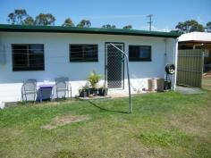  U1 N41 Brooks Road Sarina QLD 4737 ONE UNIT NEAT AS A PIN Lowset easy maintenance block unit on south east side of Sarina that captures cool south-easterly breeze. The main bedroom has full security screens, split air-conditioner, ceiling fans, new carpets and wardrobes not built-in, that stay with the property. The second bedroom is single bed sized with wardrobes, ceiling fans and new carpet also. The laminex kitchen has feature benchtop, brand new electric stove and comes with a large two door fridge. The lounge / dining room is quite spacious with new vinyl floor coverings. The bathroom has modern vanity, shower and toilet and the laundry comes equipped with washing machine and dryer. There is a single bay carport, a garden shed lawn locker and the whole property has security screened doors and windows. Owner is relocating. General Features Property Type: Unit Bedrooms: 2 Bathrooms: 1 Building Size: 95.00 m² (10 squares) approx Land Size: 399 m² (approx) Outdoor Features Open Car Spaces: 1 