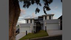  2/33 Horrocks Crescent Kearneys Spring QLD 4350 Luxurious - Contemporary - Incomparable Impressive both inside and out is this gorgeous townhouse with a north eastern aspect, and glorious city views. This home is the epitome of style and function, blending luxurious contemporary finishes with classic architectural styling. This fresh, modern abode is very much a stand out, combining elegant features and spacious rooms. Luxurious master suite with spacious ensuite Generous walk through robe 3 Bedrooms and a study Double lock up garage Beautifully landscaped and private Entertainers dream City views and lifestyle living! Close to parks & Cafe's. General Features Property Type: Townhouse Bedrooms: 3 Bathrooms: 2 Land Size: 217 m² (approx) Indoor Features Toilets: 3 Alarm System Air Conditioning Outdoor Features Garage Spaces: 2 Other Features Built-In Wardrobes,Garden 