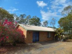  42 TO 44 TYNDALL STREET Apple Tree Creek Qld 4660 * 3 bedroom steel framed Brick Veneer home * 2023m2 / over 1/2 an acre * Good location approx 6km from Childers * Brick feature wall between kitchen & living area * 7m x 3.5m Shed * Rustic carport * 5000gal concrete rainwater tank * Whirlybirds on roof     