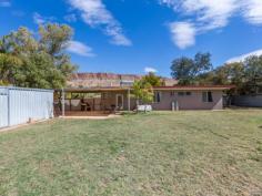  16 Forrest Crescent Gillen NT 0870 Set on a magnificent allotment of 1210sqm with glorious, uninterrupted 
views of the MacDonnell Ranges in the well sought after area of Gillen, 
this 4 bedroom home is the perfect way to establish you as an owner in 
the Real Estate Market. Entering into the large open plan 
living/ dining is quite a treat with sunlight streaming through the 
large windows in the lounge room, offering a bright fresh feel. The 
kitchen has been delightfully renovated including gas cook top, electric
 oven, new dishwasher and there is a large space for a double fridge. The
 long breakfast bar offers room to sit and enjoy the culinary delights 
prepared in the large well appointed kitchen, offering plenty of bench 
and cupboard space. Consisting of four carpeted bedrooms, 3 being
 very spacious and the 4th being smaller that could be utilised as a 
bedroom, nursery or an office. The large main bedroom has extensive 
robes and access through to the two way bathroom. To keep you cool 
during the hot summer months there are split system air conditioners in 
two of the bedrooms and ducted air conditioning services the remainder 
of the house. The backyard is massive and open, with ample room
 for all the family and pets to enjoy. It includes a 3.5 x 6.5m shed, an
 aviary and a garden shed There is a new double carport, plus 
concreted drive way for further parking. The outside of the house has 
been freshly painted and a new front fence installed. 