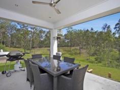25-27 Highview Ct Woodhill QLD 4285 1 Year Old/New/Waiting for you Tired of trying to find something new on acreage? Well check this out! Positioned on a fully fenced 5253m2 block is this near new quality built Stroud home. Located
 approximately 10 minutes from the thriving Jimboomba Township and 
approximately 45 minutes commute from the Brisbane CBD this property has
 the modern home as well as the country surroundings feel. Where else could you obtain a property of this calibre for this price? Added features are: * Open plan kitchen/meals/family area * Separate living room * Well appointed kitchen with a fabulous gas/electric stove * Master bedroom featuring walk in wardrobe & ensuite * Built in wardrobes * Insulation * Screens * 2 remote vehicle accommodation under roof * Ceiling fans * Higher than average ceilings * Quality fittings and fixtures * Outdoor alfresco area * School buses available And best of all, still under builders warranty   Property Snapshot Property Type: House Construction: Rendered Block Zoning: Residential Low Density (550) Land Area: 5,153 m2 Features: Built-In-Robes Dishwasher Fully Fenced Yard Gas Outdoor Living Remote Control Garaging