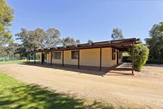 108 Anzac Rd Springhurst VIC 3682 BREAK INTO THE MARKET
 
 $224,500 
 Thirty minutes down the freeway from Wodonga sits this large family home in Springhurst township. With
 four bedrooms, all with built in robes, a large open kitchen and 
renovated bathroom, this property provides a perfect opportunity to get 
started in the real estate market. You will find a slow 
combustion wood heater, refrigerated air conditioner, and a split system
 heating and cooling unit to keep the elements at bay. There is a
 generous allotment of almost half acre. The grounds include a large 
shed with concrete floor and power, an 8m x 8m (approx.) carport, a 
permanent well and a 22,500 litre water tank for your garden watering 
needs plus a fantastic in-ground salt chlorinated pool for those 
leisurely summer afternoons with family and friends. Situated 
just 1.5 kilometres from the Hume Highway and strolling distance from 
the local primary school, parks, and the local railway station, it is a 
great location. Ideally positioned between Wodonga, Wangaratta and the 
award winning wine region of Rutherglen. To learn all the features to this property, please contact Tony Stockdale on 0428629778 to arrange an inspection today. 