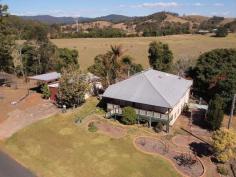  196 Kandanga Creek Rd Kandanga QLD 4570 Character Home On A Large Block
 
 Three bedroom Queenslander on 2605m2 with a two bay shed backing onto Kandanga Creek. Set
 on a large town block backing onto Kandanga Creek is this character 
filled Queenslander. There are timber features throughout this 
country-style home including polished timber floors, VJ walls and 
stained glass windows. Elevated verandahs at the front and back offer 
picturesque views of the established gardens and fruit trees. - Three bedrooms - Living area with wood-fire heater and air-conditioning - Two bay colorbond shed and carport - Walking distance to Kandanga shops. Offers closed 5pm, 17 September 2014. 
 