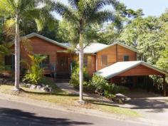 12 Cycas Close Kamerunga QLD 4870 OPEN HOME THIS SAT & SUN 1:30-2:15pm ENCHANTING RAINFOREST LOCATION Wake up to the sound of the rain forest at 12 Cycas Close located in the pretigious Rainforest Estate. There is plenty of room for everyone in this large family home consisting of 5 bedrooms plus study and rumpus. You'll love the warm timber flooring on the upper level leading to the extensive decks,which overlooks the in ground pool. Entertain in style from the large chefs kitchen with a severy to the large timber deck. The ground floor benefits from a self-contained granny flat with doors leading to the pool area. Stony Creek Road is a small boutique estate centrally located between the City and the Northern Beaches set in the lush green rainforest's of native fauna and wild life. *Large family home *5 Bedrooms, main with en-suite *Built-in robes *Extensive deck/Verandas *3 Bathrooms * Sparkling in-ground pool *Air Conditioned throughout *Granny flat *Open plan *Easy care gardens *Rain forest outlook Call me Paul Sheldon to find out how you can secure this lifestyle home today   Property Snapshot Property Type: House Construction: POLE HOME Features: 3 Bathrooms 5 Bedrooms Airconditioned Built In Wardrobes Carport Ceiling Fans Close to Park Close to Schools Close to Shops Close to Transport Ensuite Entertaining Deck Gas Cooking Inground Pool Large Entertaining area Lots of Storage