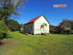  12 Gympie St Torbanlea QLD 4662 CHURCH ON 1012M2 (1/4 ACRE) For Sale a remarkable building which has been a central land mark for the community of Torbanlea for more than a century. This well loved property exudes that warmth of character one feels when entering a loving caring & safe environment. Currently Zoned for use as a community facility and would suit Community activities, clubs, indoor sports clubs, or child care and more. The potential is there to convert this wonderful building into a residential dwelling, Fraser Coast Regional Council has advised that such a change of use is Impact accessible and would require an application for change of use. Once this has been completed then simply an application to FCRC with conversion plans and building application, and you'll then have a remarkably unique home, with an equally rich place in this wonderful communities history.   