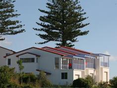  Bermagui NSW 2546 Enjoy ocean views from the living area and balcony or a short walk over reserve (opposite) to an unspoiled beach, yet right in town. Each townhouse has a large upstairs patio to soak up the ocean and reserve views and the smell of the seaspray and a single garage with internal access. Unit 4 includes a purpose built (huge) boat store garage design for big boats, caravans or storage. A really lovely outlook in an outstandingly convenient location. Don't delay inspect today. 