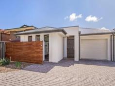  66A Wallala Avenue Park Holme SA 5043 $415,000 - $430,000 ARE YOU LOOKING TO DOWNSIZE OR A FIRST HOME BUYER? • VIRTUALLY BRAND NEW - ONLY 14 MONTHS OLD • FEATURES 3 BEDROOMS • MASTER BEDROOM WITH ENSUITE AND WALK IN ROBE • BEDROOMS 2 & 3 WITH BUILT IN ROBES • MODERN MAIN BATHROOM WITH BATH • LARGE OPEN PLAN KITCHEN/DINING AND LOUNGE AREA • PLENTY OF CUPBOARD AND BENCH SPACE IN THE KITCHEN • GAS HOT PLATES AND WALL OVEN, PLUS DISHWASHER • DOUBLE SLIDING DOORS OPEN ONTO ENTERTAINING AREA • SEPARATE LAUNDRY WITH LINEN AND BROOM CUPBOARD • SECURE ONE CAR GARAGE WITH SPARE SPACE FOR ANOTHER VEHICLE • 5 MINUTES TO TRAIN & TRAM • 10 MINUTES TO FLINDERS MEDICAL CENTRE • CLOSE TO MARION & PARK HOLME SHOPPING CENTRES DON'T MISS THIS OPPORTUNITY!!! 
