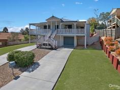  20 Hatia Grove Ferny Grove QLD 4055 $580,000  This stylish replica Queenslander home is the opportunity you have been waiting for. Perfectly positioned on an expansive 760 sqm block in a quiet, elevated street of Ferny Grove the home boasts multiple living and entertaining spaces and a floor plan which caters to the needs and wants of a modern family.   Enjoy the special ambiance that is created with the careful blending of old and new. Enjoy the timeless appeal of polished floors, high ceilings and the charm of the quintessential Queenslander  Features Include:  - Classic Queenslander features throughout such as polished pine floorboards  - 4 bedrooms and ducted air-conditioning throughout  - 2 living areas and a separate dining room  - Spacious modern kitchen with plenty of storage  - Entertainers rear deck plus full width front veranda  - Excellent use of the block allowing plenty of house whilst retaining yards for the kids to play and only a short hop, skip and jump to local parks  - Close to schools, transport (rail & bus) and shops  