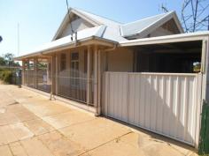  30 Derribong Street Trangie NSW 2823     $159,000   	 The Old Trangie Post Office has been gracefully renovated into a spacious 2 bedroom & 2 bathroom home with original 14 foot ceilings and decorative features,newly renovated timber kitchen with gas stove, freestanding portable sauna, spacious lounge & dining room with gas point. Lockable garden shed, 3 car carport. Timber side decking & front porch, fenced on 3 sides. Large side verandah ideal storage or add on extra rooms. Primary school next door & short walk to town centre all this making this property very unique and a once in a lifetime opportunity for the wise investor, first home buyer or retiree. Property Details Bedrooms 		 2 Bathrooms 		 1 Ensuites 		 1 Contact Details Agent:  Andrew Ball Phone:   Mobile:  0407964405 