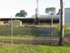 66 Kularoo Dr Forster NSW 2428 Large rental frame metal factory on prime corner site in Forster, 50.4 metre frontage to Kularoo Drive and average depth about 57 metres (total area 2912m²). Factory consists of Front Office Reception to Kularoo Drive with double sliding door access/lunchroom/shower/WC and contains a total area of 573m² (37 x 15.5) with 230m² of mezzanine storage. Agent’s comments: Property located on busy main thoroughfare through Forster Industrial area giving access to One Mile Beach residential areas, close to Forster Shopping Centre and enjoys excellent passing traffic exposure. Suit many industrial or secondary commercial uses and priced to sell quickly. Suitable to sub divide with vacant land to Kularoo Drive 25 metre frontage and 60 metre average depth 