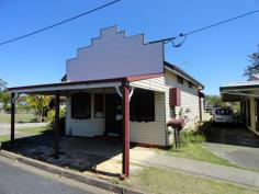  2 Ryan Street South Grafton NSW 2460 A delightful 4-bedroom weatherboard residence plus the "old corner store" ! 
 
Features include: a large central living room opening onto the front 
verandah; 2-bathrooms including a huge en-suite; dining area off the 
kitchen; polished flooring; ducted air-conditioning; side and back 
verandahs. 
 
The "old shop" has a wonderful facade of a bygone era and comprises an 
expansive shop floor area plus a utility room with toilet and basin. The
 Business Zoning adds all sorts of possibilities here ! 
 
A handy location to the South Grafton business area yet nicely tucked 
away in a private location. Enjoys an elevated site with a lovely 
northerly aspect. 