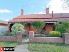  260 Bourke St Goulburn NSW 2580 Semi detached brick home located only a short distance from the CBD of Goulburn. Having 3 bedrooms plus a study. Lounge room with gas heating, a seperate dining area or sunroom and a functional kitchen. The home has polished floor boards throughout. An enclosed backyard with side gate access for off street parking for 1 car. Block size of approx 335m2. Read more at http://goulburn.ljhooker.com.au/6JXF9D#PZgwiRAkP08Qet85.99 