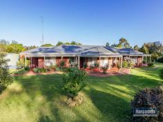  63 Fairway Drive Drouin VIC 3818 This magnificent 42sq family home would suit a large family, or two families for that matter! Sitting on a very pretty 1¼ acres with a separate paddock for the pony, beautiful gardens and a very impressive outdoor entertaining area, this home really has it all. This steel frame home was built by GJ King so quality was of utmost importance. The formal lounge and the billiards room/rumpus overlook the lovely gardens, while the family room enjoys the heat from the wood fire. Gas ducted heating, ceiling fans and 2 split systems offer comfort all year round. The 4 bedrooms are all of good size with BIR's while the master has a WIR and ensuite with corner spa. The spacious kitchen has a dishwasher, gas cook top and electric oven. - See more at: http://drouin.harcourts.com.au/Property/588011/VDN24323/63-Fairway-Drive#sthash.oda1e4JA.dpuf 