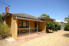  5 Jersey St Narrogin WA 6312 Sell the car! This property is so close to the CBD that you may no longer need a car and as Narrogin Primary School is less than 200m away, you can watch the kids walk to school. This home has so much life inside, it just needs a loving family. The bright bold colours and lead lighting give this house so much character you will want to move in straight away. There are two large bedrooms at the side of the house and a smaller bedroom/office near the rear. The reverse cycle air-conditioned lounge/dining leads into the kitchen which has lots of cupboard space. Out the back there is a single lock up garage and lots of space for entertaining on the spacious rear patio. There is an added bonus of a granny flat out the back that could be renovated and turned into a studio, teenage retreat, man cave or an extra bedroom for guests. Get in quick as this property will not last long! Other features: Close to Schools,Close to Shops,Fireplace(s),Polished Timber Floor,Lead Light Windows 