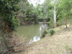 Lot 2 Rodwell Road, Brooloo, Qld 4570 
 All the hard work is done, this block is presented in immaculate 
condition with your every need considered. 72 fertile acres with 
approximately 400 metres of frontage to a permanent creek that offers 
deep water swimming holes, shaded picnic areas and rainforest trees. 
Approximately 60 acres of lush creek flats, minimul flooding issues. 
Plenty of land to build your dream home or weekend 'Love Shack'. Fenced 
into four paddocks this block offers excellent grazing opportunities. 
Steel stockyards with good access. Tucked away from the world this block
 offers absolute privacy, peace and quiet. Only 14kms from Kenilworth
 and 8kms from Imbil, this property enjoys a perfect location with 
bitumen road (gravel driveway). 4 Bay Colour Bond Shed 16m x 12m on 
concrete slab and extra high roof to suit large machinery shed. 

 The block is situated at Lot 2 Rodwell Road, Brooloo. 15kms north of Kenilworth towards Imbil. 
 