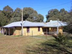  2241 Batlow Road Tumbarumba NSW 2653 OFFERS OVER $115,000 This home offers a great opportunity for someone looking for a peaceful rural lifestyle. Located in the quiet village of Laurel Hill, 22kms from Tumbarumba. Features include: 4 bedrooms, Open plan kitchen, dining and living room, Wood heating, Set on a large block of 1695m2,  Water supply via 2 rain water tanks, This was orginally the Laurel Hill Store so there is a large shop front area, small kitchen/preparation area and store room. View Sold Properties for this Location View Auction Results General Features Property Type: House Bedrooms: 4 Bathrooms: 1 Land Size: 1695 m² (approx) $115,000+ 