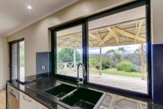  76 Levett Road Kersbrook SA 5231 Price $599,000 to $639,000 4 Bed, 2 Bath, Great Shedding! Tranquillity coupled with amazing views situated on an allotment of approximately 6.76 acres is this steel frame wonderful family home. Perched on the high side of Levett Road and being on the out skirts of the township on a no through road means minimal traffic flow and surrounded by manicured land holding, this home will cater for the families entire wants. Conveniently approx. 20 Minutes from TTG, Elizabeth and Gawler this North facing home is only minutes from the Heysen trail for the Nature loving ones amongst us. Shedding aplenty, large dam, fenced into 3 paddocks, fruit trees, glass house, fern house, fan forced combustion heating, ducted evaporative air-conditioning, rain water tanks and all combined in a low maintenance holding that is amazingly picturesque in nature. Upon entry you are greeted by a separate entrance that leads into the living areas. The unique quality of this abode is that all the living areas are conveniently positioned towards the front of the home taking advantage of the views. The very generous family room has glass sliding doors to the rear entertaining and large windows that allow for ample light penetration to all fascist of the living areas, plus a door that conveniently opens up onto the main high clearance garage. The sizeable lounge again features those large tinted windows plus a large fan forced combustion heater that easily takes care of the homes creature comforts during winter, plus LED down lights. The glass splash back kitchen alone is a true work of art with solid granite bench tops and ends, 2 pac finish, ample pot draws and cupboards; plus they are all self-closing in design adding a touch of class. There's a welcomed addition of a truly large island bench with a massive amount of workable food preparation area to avail oneself to. There are great overhead cupboards with glass doors and LED down lights that when entertaining at night creates a truly remarkable atmosphere of elegance. Inclusions such as a stainless steel dishwasher, stainless steel built in microwave, stainless steel 900 under bench oven with rotisserie, 900 halogen cook top and an exquisite 900 chrome and glass range hood. A ceramic duel sink plus a funky tap that has a removable nozzle to hose down dishes if desired. One entire wall has hidden cupboards with no door handles that are floor to ceiling in design allowing for extra storage. There even is provision for a fridge/freezer side by side and all finished with stainless kick boards. The sink even has a filter attached so all the water is filtrated. The large window that is perched above the sink was crafted by the meticulous owners to be a servery window that feeds directly onto the outside pergola, so when entertaining it's a convenient way of transferring food directly to where it's needed quickly and easily. This immaculately presented kitchen is all finished with LED downs lights and modern LED light switches. The laundry boasts built in robes plus it's absolutely ginormous in design, so washing day will be more of a bearable task than even before. The large carpeted master bedroom features a massive walk in robe and ensuite with a shower, toilet, large vanity and heat lamps. Bedroom 2 is also large in design but features a floor to ceiling glass sliding door built in robes along with bedroom 3 and 4, and they again are all carpeted for extra comfort. The bedrooms all are situated to the rear of the home and separate from the living quarters by a hallway thus helping to reduce noise levels while entertaining. The master bathroom has a separate bath and shower with large vanity unit plus the toilet is separate to reduce traffic flow in peak usage times. A flow through driveway adds a touch of elegance upon arrival to the property and leads you to the man loving high clearance colour bond garage with concrete and power. It boasts an electric roller door, two sliding doors and will accommodate 3 cars under cover plus there is so many parking spaces external from this area. There is another galvanized shed with an entrance to the large main paddock that also boasts concrete flooring and power plus a great sized galv shed that is conveniently being utilized as a shearing shed with shoot to exit the sheep and tack shed combined. There is horses yards attached with a lean to for shelter.  3 Fire hoses are strategically placed around the house and are attached to a petrol fire pump for emergencies. Rain water tanks are aplenty for the home has no mains water so there is no SA water charges. The large dam with yabbies has a new pump that supplies the garden so there is no wastage of the rainwater. There are 5 rainwater tanks to be utilized and all water is pressurized to the home. Tool shed, pop up sprinklers, down lights under the eaves, large hot water service, 1 paddock with electric fence, assortment of fruit trees and super quick internet are just to name a few features.  So to view this truly magnificent lifestyle property awash with features please call Andy White on 0413 949 493 TODAY! 