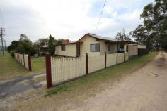  140 Miles St Tenterfield NSW 2372 $240,000 Located a short walk from Sir Henry Parkes primary school this renovated 4 bedroom family home presents well. Comprising open plan lounge and dining with wood heating, modern electric kitchen with ample cupboard and bench space, bathroom with shower and bath, second shower in the laundry, second separate toilet and rear sunroom. An outdoor entertainment area overlooks the fully fenced back yard with kid's cubby house, vehicle accommodation is provided by a single colorbond shed and carport. Mark this property as one to inspect. Property Features Property ID 	 8275343 Bedrooms 	 4 Bathrooms 	 2 2nd shower in the laundry Garage 	 2 Kitchen 	 Electric stove & range hood, good bench space Laundry 	 At rear Lounge 	 Open plan with down lights Back Yard 	 Cubby house, dog or fowl yard Close to 	 Primary School Flooring 	 Carpet & Lino Under House 	 Brick peirs Land Size 	 765.1 Square Mtr approx. Building Type 	 Timber/Iron Zoning 	 RU5 Village Floors 	 Yes Rates 	 $1900 Yearly Built In Robes 	 Yes Courtyard 	 Yes Fully Fenced 	 Yes Other Features 	 Wood Heating Outdoor Ent 	 Yes Shed 	 Yes 