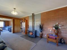  595 Native Corners Rd Campania TAS 7026 $365,000+ Charming Country Living With winter on the way, are you looking for a cosy country home where you can snuggle in front of the fire? You'll love coming home to your own sweet rural retreat. Only 35 minutes from Hobart and set on about 5 1/2 acres of low maintenance cleared land, this lovingly maintained home is perfect for the homebuyer who longs to get away from it all without breaking the budget. This home has a welcoming feel to it that makes you want to linger. Upon entering, you'll notice the wood heater in the lounge has been placed against an inside wall, ensuring it heats the whole house. Attractive windowed doors with decorative glass can be closed to separate the two living areas. The main lounge window looks out onto the nearby hills and valleys that are so flawless it is like having a beautiful painting on your wall. The kitchen inspires visions of home cooked meals, mouth-watering casseroles and roasts. There is lots of pantry space and a kitchen island for extra bench space. A bay window in the generous dining area adds charm and gives a resplendent view of the hills and yard, complete with adorable gazebo, swaddled in fragrant geranium.  Toward the back of the house is the bathroom and with its deep tub and decorative glass window you are sure to be enticed into many a relaxing bubble bath. The laundry is practical and functional with good cupboard space. Surprisingly spacious yet still having an intimate feel, this home has been cleverly designed to have separation between the master bedroom and the other sleeping quarters, ideal for families who appreciate their own space and privacy. Two cosy bedrooms are at one end of the hall and get good sun. Both have built in robes. The inviting master bedroom at the far end of the hall is much larger and has a sizeable built in robe plus views from the generously size window. You can lie in bed and take in the scenery upon waking. The property also has a large colourbond workshop/garage, raised garden beds out the back for growing your own vegies, a garden shed plus three huge water tanks. Further up the hill is a barn/woodshed. To complete this idyllic country home, a covered Verandah runs all the way around the house, with a deck placed off the second living area. This area is perfect for outdoor entertaining with friends on warm summer evenings or a place to cosy up with a loved one, share a bottle of wine and marvel at the stars. Underneath the deck is a storage area.  By the way, this house with its sunny aspect and inviting feel will draw all your friends in and it is likely you will have friends and family dropping by all the time.  It's just that kind of place. Call Aaron or Helen now to secure your private inspection time.   Property Snapshot  Property Type: House Aspect Views: Mountain Construction: Brick House Size: 147.00 m2 Land Area: 5.50 acres Features: Built-In-Robes Decking Gazebo Heatpump Rumpus Room 