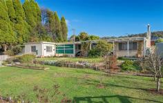  41/43 Crowther St Beaconsfield TAS 7270 $229,000 - $249,000 Property Information Originally built in 1966 as a Rectory this large home has been modernised throughout, boasting additions such as solar panels (a 3kw system), new guttering, new security window screens, relatively new kitchen, new dishwasher, new carpet in the living area etc. that now represents a great opportunity for families, entertainers, hobbyists etc. to secure a larger than average home complimented by generous fully fenced grounds, a double garage, a double carport (tall enough to house the average size boat), an undercover entertaining area and 3 garden sheds providing more than adequate outdoor storage. Meticulously maintained, the home is composed of generously proportioned rooms allowing for flexibility of use for bedrooms and living zones, combined with a real bonus being the 5th bedroom, kitchenette and second toilet set apart from the main house (subject to council approval this area could be converted to separate living quarters with very little work or simply use as is for guest accommodation, extended family, teenagers retreat, hobby space or the perfect office, particularly for those that work from home needing their own quiet space away from the residence).  The main residence complete with ducted wood heating comprises a spacious entrance hall, 4 double/queen size bedrooms all with built in robes, bathroom including a bath and separate shower, modern kitchen incorporating ample bench and cupboard space, breakfast bar, dishwasher and a pantry, dining with lovely polished boards (overlooking the garden), light airy lounge, large laundry with built-in storage and finally via the undercover entertaining area to the separate kitchenette, 2nd toilet and king size 5th bedroom with built in shelving. A leisurely stroll through the 1618sqm corner allotment, reveals lovely established trees combined with a vast array of plantings for colour, plenty of space for the children to run and play with endless nooks and crannies for them to explore, safely fenced for pets, veggie garden with room for the keen gardener to expand if desired, multiple fruit trees, three storage sheds and a chicken run. Conveniently located within walking distance of local shopping, primary school, doctor, vet, chemist etc., approximately 30 minutes from Launceston and even closer to George Town, this property will hold appeal for commuters and locals alike. A drive by will not suffice, inspection is a must to fully appreciate all this affordable property has to offer. Call Kaylene Bushby now to arrange your viewing of a property that you will be proud to call home ! Floor Area 	 148 sqm Land Size 	 1618 sqm Tenure 	 Freehold Approx year built 	 1966 Property condition 	 Good Property Type 	 House Garaging / carparking 	 Double lock-up, Open carport, Off street, Free standing Construction 	 Brick veneer Joinery 	 Aluminium Roof 	 Roof Decking Flooring 	 Carpet, Polished and Other (Lino) Window coverings 	 Drapes, Curtains Heating / Cooling 	 Woodfire (Closed) Chattels remaining 	 All Fixed Floor Coverings, All WIndow Furnishings, All Light Fittings, Insect Screens; Three Security (Screen) Doors, WIndow Security Screens, Three Garden Sheds, One Electrolux Chef Wall Oven, Hot Plates, One Range Hood, One Dishwasher, One Saxon In-Built Wood Heater and One Clothes Line. Kitchen 	 Modern, Dishwasher, Separate cooktop, Separate oven, Rangehood, Breakfast bar and Pantry Living area 	 Separate living, Separate dining Main bedroom 	 Double and Built-in-robe Bedroom 2 	 Double and Built-in / wardrobe Bedroom 3 	 Double and Built-in / wardrobe Bedroom 4 	 Double and Built-in / wardrobe Extra bedrooms 	 Double plus robe Main bathroom 	 Bath, Separate shower Entrance 	 Large Entrance Hall Laundry 	 Separate Views 	 Urban, Rural Outdoor living 	 Entertainment area (Covered), Garden Fencing 	 Fully fenced Land contour 	 Flat to sloping Grounds 	 Tidy, Backyard access Garden 	 Garden shed (Number of sheds: 3) Water heating 	 Electric Water supply 	 Town supply Sewerage 	 Mains Locality 	 Close to shops, Close to schools 