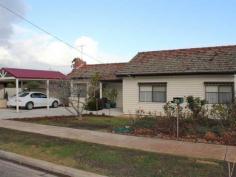  21 Manor St Bacchus Marsh VIC 3340 $289,000 Outstanding Investment In The Heart of Town!!!!Have you been waiting for a great investment opportunity in the centre of town to come along? Well here it is! With close proximity to everything, this Manor Street weatherboard is perfect or an investor or first home buyer. Comprising with 3 bedrooms, 2 separate living areas either ends of the house kitchen and meals area overlooking large under cover pergola with small garden shed, central bathroom with separate shower and bath with toilet plus another separate toilet near laundry. Other features include new single carport and colour bond fence and low maintenance yards. Either starting up or adding to your investment portfolio this property ticks all the boxes. Call now to arrange your inspection!! Internet ID 318787 Property Type House Features Air conditioning 