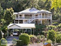  16 Wollundry Pl The Gap QLD 4061 $900,000 Proudly situated on 1000sqm at the end of a quiet cul-de-sac, offering peace and tranquillity high up among the treetops, sits this magnificent family home that commands attention and brings you back to nature. With views across to Mt Coot-tha and the D'Aguilar National Park from the wrap-around deck, this home strikes the perfect balance between the relaxed peacefulness of its setting and the convenience of living close to all local amenities. This home offers fantastic flexibility, with a fully self-contained granny flat on the lower level, which could be utilised as the perfect space for family or guests, a retreat for teenagers or even the opportunity for passive income should you wish to rent it out. You will love entertaining on your large rear deck, listening to the waterfall trickle into the fishpond and the call of the abundant local bird life. Situated in the Hilder Road State school catchment area and in close proximity to Mt St Michael's and Marist Brothers Ashgrove secondary colleges, this terrific family home offers the following features: Upstairs Master bedroom: King-sized, with air-conditioning, large walk-in robe and huge ensuite with recessed bath Bed 2: Double, with built-in-robe and amazing views Bed 3: Single, with built-in robe, ceiling fan and lovely views Bed 4: Currently configured as a Study  Formal lounge room with huge banks of bookcases and French doors opening on to the wrap-around deck which showcase stunning views Kitchen with dishwasher, pantry, electric cook top, convection oven, breakfast bar and double sink Large air-conditioned open-plan family living area and dining area with views out to the lush gardens Main bathroom with separate toilet, shower and IXL unit Separate laundry with masses of storage Formal entry  Large rear deck with water feature and fish pond Fully screened Downstairs (legal height) Fully self-contained granny flat with a kitchen, bathroom, bedroom and two large living areas Access to patio 3,000L water tank, plumbed-in to all exterior taps and to the water feature Workshop Large enclosed chicken run Established low-maintenance landscaped gardens - no lawn to mow Triple open car port Extra car space at the side of property Rates: $350/qtr Amenities 4.0km to Ashgrove/The Gap Golf Club 3.2km to The Gap Shopping Village 1.1km to The Gap State School 3.0km to The Gap State High School 11k to the CBD 3.3km to Yoorala St Community Garden  Walking distance to public transport The Gap is known for its remarkable beauty, large character homes, leafy streets and hilly aspect. Backing onto beautiful reserves of native bushland and National Parks and surrounded on three sides by Mt Coot-tha, Mt Glorious, Mt Nebo and Taylor's Range - making it the perfect bush retreat for city professionals and the perfect place to raise a family. To the south and west of The Gap is D'Aguilar National Park, known for its sheltered pockets of sub-tropical rainforest, dense forests and spectacular views. There are designated bushwalks throughout the park, and on Mt Nebo Road, you'll find Walkabout Creek - an interactive wildlife education centre, with a new Family Swimming Area on Enoggera Reservoir. There is a variety of speciality stores and medical facilities, as well as a shopping village, access to playgrounds and dog parks and The Gap golf course.  If you value privacy, enjoy entertaining and love the pleasure of being surrounded by nature, this home is the one for you. The setting is perfect and the location is first-class, come and enjoy the best of what The Gap lifestyle and living has to offer. Land Size1000 sqmProperty conditionGoodProperty TypeHouseHouse styleHighset, QueenslanderGaraging / carparkingOpen carport, Off streetConstructionTimberJoineryTimberRoofIronInsulationCeilingWalls / InteriorGyprockFlooringCarpet and TilesWindow coveringsDrapes, Blinds (Venetian)Heating / CoolingSplit cycle a/c, Ceiling fans, ElectricProperty featuresSafety switch, Smoke alarmsKitchenOriginal, Open plan, Dishwasher, Separate oven, Rangehood, Double sink, Breakfast bar, Microwave, Pantry and Finished in LaminateLiving areaFormal loungeMain bedroomKing, Balcony / deck, Walk-in-robe, Heating / air conditioning and Ceiling fansEnsuiteBath, Separate showerBedroom 2Single and Built-in / wardrobeBedroom 3Double and Built-in / wardrobeBedroom 4DoubleMain bathroomSeparate shower, HeaterEntranceFormalLaundrySeparateViewsBush, UrbanAspectEastOutdoor livingEntertainment area (Covered), VerandahFencingPartialLand contourSlopingGroundsLandscaped / designerGardenGarden shed (Number of sheds: 1)Water supplyTown supply, Tank (s 