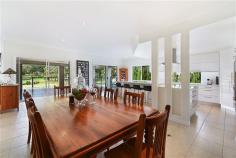  18 Canada Pl Arundel QLD 4214 $1,160,000 A home which radiates style, warmth and beauty. This is one of those properties you'll love to come home to after a long day. Not only does it have room for all the family it is also cosy and inviting. A stunning property located in one of Arundel Hills best streets, lined with trees that burst into a sea of white blossoms in spring (just beautiful). Backing onto the Arundel Hills Country Club you will never be built out, just sit back relax with your favourite drop and watch the players putt on the 16th green. This is not just a golf course but a boxing ring for your local Kangaroos too! That's right you will always be entertained. 5 Big bedrooms, 3 bathrooms all beautifully presented. A kitchen to die for it's all here, Miele appliances everything is soft close. A chef or cook's dream. This hub of the home is state of the art! Entertain on the big timber back deck while the kids frolic in the pool and Dad flips prawns on the BBQ, whilst watching his favourite football match on the big screen TV. Work from home, there is no need to leave the house with a big built in home office, which has everything you need to run a business. There is nothing to do here just move in put your feet up and wrap yourself in your luxurious surroundings. Close to schools, shops, transport even a short drive to the Broadwater.  -4 Big bedrooms upstairs -1 Ensuited guest bedroom downstairs -3 Bathrooms -3 living areas -State of the art built in home office -Pool -Ducted aircon upstairs / split systems downstairs -Manicured low maintenance gardens -This is not a gated community has no body corp Arundel is one of the most diverse residential suburbs of the Gold Coast, with everything from executive homes to townhouses.  This neighbourhood offers a wide range of developments including townhouses, villas, zero lot line homes, and middle to upper range single unit dwellings. Arundel has seen strong steady growth over the last five to seven years covering all styles of building, with strong buyer acceptance at all levels of the market - both in new and resale properties.  As a well-balanced area this trend will be even further strengthened with the continuing development of infrastructure in the area. Arundel Hills is where prestige properties can be found. This is a newer area than the wider Arundel suburb and homes here are all rendered, in accordance with stringent covenants.  Arundel residents are well serviced by a range of recreational and educational facilities. Bus links around the suburb offer good public transport for those looking to get to major Gold Coast centres, theme parks or the beach. Access to the community is bolstered by close proximity to the Gold Coast Highway and the Helensvale Rail Station.   Property condition 	 Renovated Property Type 	 House House style 	 Contemporary Garaging / carparking 	 Double lock-up, Auto doors (Number of remotes: 4), Off street Construction 	 Render and Hebel Joinery 	 Timber, Aluminium Roof 	 Concrete and Tile Insulation 	 Walls, Ceiling Walls / Interior 	 Gyprock Flooring 	 Tiles and Carpet Window coverings 	 Drapes, Blinds (Timber) Heating / Cooling 	 Reverse cycle a/c, Split cycle a/c, Ducted, Ceiling fans Electrical 	 TV points, TV aerial, Phone extensions, Rewired Property features 	 Safety switch, Smoke alarms, Vacuum system Kitchen 	 New, Designer, Open plan, Dishwasher, Separate cooktop, Separate oven, Rangehood, Extractor fan, Waste disposal, Breakfast bar, Microwave, Pantry and Finished in Granite and Lacquer Living area 	 Formal lounge Main bedroom 	 King, Balcony / deck, Walk-in-robe, Heating / air conditioning and Ceiling fans Ensuite 	 Spa bath, Separate shower Bedroom 2 	 Double, Built-in / wardrobe, Balcony / deck and Heating / air conditioning Bedroom 3 	 Double, Built-in / wardrobe, Balcony / deck and Heating / air conditioning Bedroom 4 	 Double, Built-in / wardrobe and Heating / air conditioning Bedroom 5 	 Double, Built-in / wardrobe and Heating / air conditioning Additional rooms 	 Office / study, Media, Family Main bathroom 	 Separate shower, Additional bathrooms Entrance 	 Double timber glass doors Family Room 	 Balcony / deck and Heating / air conditioning Laundry 	 Separate Views 	 Park, Private Aspect 	 North, East Outdoor living 	 Entertainment area (Covered, Uncovered and Other surface), Pool (Inground, Pebble, Salt and Security fencing), Garden, BBQ area (with lighting and with power), Deck / patio, Verandah Fencing 	 Fully fenced Land contour 	 Flat Grounds 	 Manicured, Tidy, Landscaped / designer, Backyard access Garden 	 Garden shed (Number of sheds: 2) Water heating 	 Electric Water supply 	 Town supply Sewerage 	 Mains Locality 	 Close to shops, Close to transport, Close to schools 