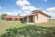  955 Walkerston Homebush Rd Sandiford QLD 4740 Property Information Auction Date: Monday 24 Aug 12:00 PM (Mackay Harcourts Office) THIS beautiful, rustic stone house with large living areas near Palmyra presents a great opportunity for a lucky buyer to get over an acre of flat land just a 15-minute drive from town at an affordable price.  With soaring cathedral ceilings, silky oak sliding doors that run the length of the house and quality construction by a stonemason, this property offers something different.  The big 4,698sq m block is a blank canvas and is just waiting for someone who wants to put in a massive shed to accommodate vehicles and other equipment.  The L-shaped house has an enormous open-plan family room with a massive lounge area, a separate dining space and a huge eat-in kitchen.  The high ceilings create a feeling of extra space and the rosewood sliding doors that lead to the covered verandas and entertainment area provide gorgeous natural light.  The bedrooms are a good size and two have split-system air-conditioners but the light-filled main bedroom is super-sized and comes with a walk-through wardrobe. The property would be ideal for a family that wants big living areas and the breathing space that over an acre of land provides but also needs something affordable that is close enough to town to have easy access to schools, shops and work places.  The owner is motivated to sell and is realistic about having to meet the current market so there is a real opportunity for a buyer to get something special with heaps of breathing space at a very affordable price.  Land Size 	 4698 sqm Approx year built 	 1985 Property condition 	 Good Property Type 	 House House style 	 Lowset, Colonial Garaging / carparking 	 Open carport Construction 	 Stone Joinery 	 Timber Roof 	 Colour steel Walls / Interior 	 Gyprock, Concrete Flooring 	 Floating Window coverings 	 Drapes Heating / Cooling 	 Ceiling fans Property features 	 Safety switch Kitchen 	 Open plan Living area 	 Open plan Main bedroom 	 King Bedroom 2 	 Double Bedroom 3 	 Single Main bathroom 	 Spa bath, Separate shower Laundry 	 Separate Views 	 Rural Aspect 	 North, East Outdoor living 	 Entertainment area (Covered and Paved), BBQ area (with lighting) Fencing 	 No fencing Land contour 	 Flat Grounds 	 Tidy Water heating 	 Electric Water supply 	 Bore Sewerage 	 Septic 