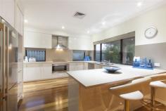  7 Conimbla Ln Aubin Grove WA 6164 Property Information Open Home Dates: Saturday 26 Sep 2:20 PM - 2:40 PM Sunday 27 Sep 2:20 PM - 2:40 PM FIXED DATE SALE ENDS 7th OCTOBER @ 4PM ALL OFFERS PRESENTED!! Magnificent in every sense, this luxurious residence is sure to impress. The property sprawls over a generous 608sqm block with multiple entertaining areas and lush landscaped gardens - taking family living and entertaining to a whole new level! First impressions offer perfectly manicured gardens and a grand facade leading to an impressive portico. Step inside to discover the most glamorous of family homes, where every detail has been carefully considered and realised with no expense spared.  A magnificent floor plan echoes the spacious allotment the home is set on with well-proportioned living areas, providing formal and casual designated spaces that span out to an equally impressive alfresco. Quality Spotted Gum timber flooring, high ceilings, beautiful colour schemes and rich finishes feature throughout the home, creating an allure that will not be denied. There is no shortage of space to ensure absolute comfort and convenience. This includes a sumptuous lounge/theatre room, large games room and a separate study or fifth bedroom, as well as the most impressive open plan living and dining domain encompassing the designer kitchen.  The centrally located modern kitchen will impress the fussiest of chef's, boasting state of the art appliances, banks of cupboards, Ceaser stone bench tops, overhead storage, induction cooktop, walk-in larder and large fridge recess. Server windows offer easy meal service to the alfresco making summer BBQ's and entertaining a breeze! There are four bedrooms offering the flexibility to accommodate the entire family and guests. All of the bedrooms are wonderfully sized with magnificent storage and stunning decor. This includes the lavish master room, complete with His and Her walk-in wardrobes and lavish ensuite featuring a double shower. The property is further enhanced by a separate powder room and laundry that is brilliantly equipped with intelligent storage solutions. Additional features include ducted reverse cycle air-conditioning, shoppers entry, LED lighting, security alarm, Crimsafe security doors, quality window treatments and a double lock-up garage with additional storage space and access to the rear yard.  Outside feels like an extension of the living accommodation with instant access to the fully paved alfresco - ideal for relaxation or simple family dining. The gardens are fully landscaped and reticulated and boasts a garden shed for extra storage.  Lifestyle and convenience are paramount with an abundance of parklands at your doorstep. Additionally, the property is very close to Aubin Grove Primary, the freeway, Transperth bus links, and close proximity to Cockburn Central and the upcoming Aubin Grove Train Station, making this place a well-connected family and commuter destination!  Please contact us for more information or to arrange a viewing. Property Type 	 House 
