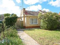  5 The Parade Marion SA 5043 2 HOMES IN ONE ON A MASSIVE ALLOTMENT! / HUGE POTENTIAL Tender Details: Mon 14/09/2015 03:00 PM This is the opportunity that the keen renovator has been looking for.  A very large solid brick family home, that is is need of refurbishment and imagination.  The flexible floor plan would allow a separate self contained teenage retreat with it's own second bathroom, or perhaps provide in-house care for a family member.  Offering 5 generous bedrooms, this home will suit a large family.  The solid timber kitchen has the convenience of gas cook-top, oven and a nice eat-in breakfast area. There is a place for everything with ample cupboards  With a formal lounge, separate dining room and a rear facing family room.  All of this on a 900m2 allotment, overlooking the tranquil waters of the Oaklands Park Wetlands. Go for a walk, take the kids for a bike ride, what a location.  Or perhaps start a fresh and build that Dream Home, in this location you can see why this area is so desirable. Be quick, this property will be highly sought after. 