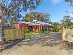  54 Earl Cres Bannockburn VIC 3331 $429,000 - $469,000 Privacy and Location - 1692mt2 Approx Great position and space for the whole family to enjoy. This well cared for home with bull nose verandah sits on a lovely 1692mt2 approx parcel of land with mature trees and gardens giving you ample privacy.  The home comprises three bedrooms, two with BIR's and master bedroom with feature bay window, WIR and ensuite. The formal living area features dado timber walls and overlooks the lovely gardens. The dining area, with solid fuel heating, dado walls and raked cathedral ceiling, adjoins the timber kitchen with slate floors, electric cooking and pantry. The bathroom has a fantastic corner spa bath and timber vanity.  Outside there is plenty of room to move, single carport at the rear of the home and a single powered and concreted garage.  This property will not disappoint, call today to arrange an inspection. 