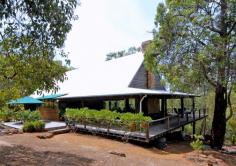  731 Reen Rd Gidgegannup WA 6083 $1,950,000 This unique property is set in a wonderful elevated position. The site allows for total privacy with birds being your only onlookers. North facing, architect designed (Robert Spooner) robust masterpiece. Oregan beams blend with cedar to provide 300 sqm of glass-clad living space, this is further extended by 250sqm of decking where you can enjoy 360 degree tree top views. There is a 50sqm parent retreat which is enhanced further by the loft living area of 80sqm, large enough for 3 further sleeping areas. 10mm x 2.5 metre glass wall provides eye to eye contact with the local bird life. A 54 sqm garage and workshop blend with the home. This home is a rare find. 
