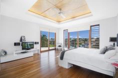  32 North Point Banksia Beach QLD 4507 $1,695,000 FIXED COMMISSION At Harriet Lee Property you know you are onto a winning formula. Of course not only do you save those valuable dollars with Harriet Lee's Fixed Commission, at $5850 +GST, you know you are working with a real property agent with a real passion for her clients property needs This imposing family home sits proudly on a large North Facing 1,021m2 block and boasts 20 metres of unobstructed waterfront. From the moment you enter through the 3.3 metre high pivot feature door you will be mesmerised by that water view. This home has been designed to embody everything the Queensland lifestyle offers and was once featured in “Queensland Homes”. Every space within this impressive home has been thoughtfully designed around water vistas.  Entertain family and friends all year round. With two alfresco dining areas you can choose to entertain by the pool or overlooking the canal. An elegant use of timber joinery and flooring is perfectly balanced against a clean white palette to create a sense of calm sophistication.  4.4 metre high ceilings over the living area provide the grandeur you expect from a property of this stature.  Quality of build and design is evident to all who enter and the astute buyer will not be disappointed. Features: Quality construction with a combination of core filled concrete block and commercial brick veneer, walls and ceilings insulated, first floor suspended concrete slab, comfort plus glazing Stunning 25 metre pool with rimless glass surround Huge foyer entry – see that mesmerising view as soon as you walk in Bright, open plan living and dining area with enviable views to the pool and canal 4.4 metre high ceiling to the living area provides further grandeur to the home Gourmet kitchen with quality Miele & Bosch appliances, including coffee machine, wine fridge, dishwasher, induction hob, water purification etc Boasting 4 bedrooms each featuring ensuite bathrooms, walk in robes, air conditioning and private north facing balconies with water views The master suite possesses an opulent ensuite with spa, two walk in robes and magnificent water and mountain views Energy efficient design with 5 star passive solar designs, solar power generation system, UPS battery power back up system and energy efficient Daikin VRV air conditioning Monitored Intruder Alarm System and Deltacom Intercom for front gate entry Dual electric hot water system depending on occupancy. Rainwater harvesting system including a 7,500 gallon underground cast tank and automatic water irrigation system Brisbane Airports approximately 40 minutes away Fit in a game of golf at the prestigious Pacific Harbour Golf and Country Club. Enjoy the sunsets over the Glass House Mountains.  Indulge in the luxurious and prestigious waterfront lifestyle this home offers. 