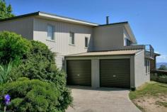  56 Gippsland St Jindabyne NSW 2627 $515,000  A rare find. A master built, centrally located, home with 180 degree lake views. Absolutely nothing to do but move in and enjoy the views. This 4 bedroom, 2 bathroom home sits high on the hill overlooking town and across the lake to Kalkite. All the living areas are upstairs and on one level. 3 good sized bedrooms are serviced by the main bathroom with a separate toilet/powder room adjacent. The huge master bedroom has a wall of built in robes, and an ensuite with a separate toilet. The home is warmed by a slow combustion fireplace which is a centrepiece of the lounge. The spacious lounge/dining area has high ceilings and opens out onto a deck which offers great lake views. The recently renovated kitchen has a walk in pantry, gas cooking and a gas heater. Downstairs the double garage leads into a storeroom which could easily (STCA) be converted into a self contained flat with separate entrance. Alternatively it could be a games/rumpus room or the all important â€œmancaveâ€. A small, easily maintained, established garden at the rear of the house, has room for the dog and the trampoline. Property Details Bedrooms 		 4 Bathrooms 		 2 Garages 		 2 