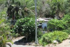  30 Olympus Cres Magnetic Island QLD 4819 $510,000.00 ARCADIA - OUTSTANDING POSITIONThe address says it all Olympus Crescent, Arcadia, Magnetic Island..  Just a short walk to Alma Bay and located at the end of this well known and well sought after street is this masonry block duplex. Comprised of 1 x1 bedroom & 1 X 2 bedroom units - set upon a 1,214 sqm block which offers views across Cleveland Bay from so many points. Sit in your front garden and take in the views or wander across to the lookout and be amazed.  This is an opportunity to secure on of the best blocks on the Island which will generate an income whilst you decide what you want to do with it. But be quick. Property ID: #2833752Price: $510,000.00 Property Type: House For SaleLand Size: 1214 M2House Size: -Council Rates: -Water Rates: -Strata Levy: - 