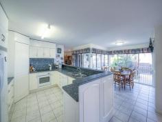  19 Callaghan Dr Taranganba QLD 4703 $620,000 PRICE DROP...Take a sencond look, This is a MUST see It would be easy to appreciate the very workable traditional kitchen in this home, then when its time to eat, sit in the dining room and look over the pool area through the roof to floor windows which surround the dining table. A great place to sit and take in the sun when it starts getting a bit nippy. With 2 living rooms being in separate areas of the home means a couple of beers and the footy can be on the TV in one room and a chocolate, bag of popcorn and a good movie on the TV in the other.  There are 4 generous sized bedrooms, 2 of which are classed as main bedrooms with an en-suite off each. The main bedrooms are at either end of the home which makes it easy for everyone to have their own space. There is also a main bathroom for the other 2 bedrooms of which could both fit a queen bedroom suite.  Invite the family or friends over for a barbie, sit around under the covered area and chat all while having the feel of being in your own private hideaway. Take a dip in the pool and if its too cold hop under the outdoor heated shower to warm up. The laundry has easy access to the clothesline from the fully lockable double car garage. The floor on the garage has seamless flooring that makes an easy to clean surface, so there would be no problem cleaning up oil leaks or petrol spills.  The sea view is just an added bonus to this complete package. This fully air-conditioned, very well built, presentable home inside and out with 20 solar panels installed is a must see, so make an appointment to inspect as you won't be disappointed.   Property Snapshot  Property Type: House Features: Air Conditioning Built-In-Robes Close to schools Close to Transport Ensuite Established Gardens Family Room Fenced Back Yard In-Ground Pool Remote Control Garaging Security Screens Undercover Entertainment Area Waterview 