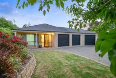  25 Kernick Ave Willunga SA 5172 $589,000 - $609,000 Inspection by Appointment 4 2 4 1,049 sqm (approx) Family living in Willunga Just a short walk from historic Willunga’s main street is this very private home set back from the street in a quiet cul-de-sac, on a very generous 1049sqm block full of native hedges, green lawns and garden beds.  Built in 1999, the large 230m2 brick home features two separate living spaces, a formal lounge and a fantastic ‘L-shaped’ family room, featuring colonial kitchen, formal dining and a great lounge with cutting edge home cinema facilities. The master bedroom is of generous size, with walk in robe and modern ensuite, and bedrooms 2, 3 and 4 offer plenty of space, two with fitted, built-in robes.  Beautifully integrated with the family room via two sets of sliding doors, a huge all weather outdoor dining area adds a third family space to the home. The back garden has a great lawn, a number of well-established garden beds, as well as a greenhouse, all under an irrigation system that can be controlled from your smartphone. The rear yard backs onto a council curated walking trail, with privacy provided by a border of hedged olives.  A fantastic three separate roller door garages can be accessed from the driveway, with one offering a drive through roller door to allow access to the back garden and the large shed (6 x 8m) partitioned to provide a 4th secure garage for boat or caravan. The home is tiled throughout, with low pile carpets within the formal lounge and bedrooms. Ducted reverse cycle air conditioning and ceiling fans control the climate, NBN has been installed to future proof the home, and a 3.5kW solar system offsets your carbon footprint and electrical bills. The rental market is begging for properties like these in the area, so be sure not to miss out on this one - either for your family, or for your portfolio. INTERNAL FEATURES: * 230sqm of quality living. * Broad tiled entrance hall with lockable access to double garage. * Large formal lounge (3 x 5m) with French doors to central hallway overlooking rear gardens. * Huge ‘L-shaped’ family space with open colonial kitchen, dining and lounge. * Modern home cinema system with ceiling mounted speakers made by Krix and a 115” retractable screen with a JVC 3D high definition projector.  * NBN fibre direct to home. * Modern kitchen with laminate benchtops, great storage and quality appliances including Bosch oven, Westinghouse dishwasher and hob, and deep double sink with filter-tap. * Master bedroom with generous walk in robe and ensuite. * Three further bedrooms, two with fitted built-in robes. * Ceiling fans and ducted air in all bedrooms * Large laundry with generous built in storage and room for second refrigerator.  * Modern family bathroom with tub and separate toilet. * 3 Phase Australian-made Actron reverse cycle air conditioning system ducted throughout. * Bosch motion security system supplemented by Logitech outdoor security camera system than can be viewed in real time on either iOS or Android smartphone. * As new low pile carpeting throughout bedrooms and formal lounge. * Quality floor tiles through shared spaces. EXTERNAL FEATURES: * Generous 1049m2 block on a quiet cul-de-sac. * Attractive front garden with lawn, native hedging and well established ornamental pear providing privacy. * Broad paved driveway to three garages. * Double automatic roller door garage with lockable access into the home via hallway. * Single automatic roller door garage with lockable door access to rear yard, and rear roller door access to back garden to allow drive through. * Attractive rear yard with expansive lawn, back-lit garden beds and established trees. * Automated pop up irrigation throughout lawn and garden beds with Hydrawise wifi irrigation system for smartphone control. * Power outlets throughout garden beds supporting ambience lighting. * Native hedging creating a number of distinct garden spaces. * Rear boundary backs onto council walking trail, with irrigated and back-lit olive tree hedging providing privacy. * Irrigated greenhouse (3 x 5m) and covered seedling bed (1 x 2m). * Two tool sheds (1.5 x 3.5m and 2 x 4m). * An array of well-established fruit trees (citrus, apple, plum, stone-fruit, pomegranate). * 1000L rainwater tank plumbed to garden. * Large undercover outdoor paved dining area (5 x 7m) with pitched roof, integrated with family room via dual sliding doors. * Small pump based fountain/goldfish pool in outdoor dining area. * Colourbond veranda to rear and side providing shaded pathway around the rear of the house. * Large work shed (6 x 8m) with three phase power, partitioned to allow for secure vehicle storage (fourth garage). * 3.5kW solar system with quality SMA Sunny Boy inverter. * Five minute walk to Willunga Hill street. * Strong rental market in area. Additional information Property Type House  Property ID 11324100928  Street Address 25 Kernick Avenue  Suburb Willunga  Postcode 5172  Price $589,000 - $609,000  Land Area 1,049 sqm (approx) 