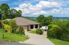  7 Rosella Pl Nambour QLD 4560 $529,000 POSITION PRESTIGE PRIVACY PANORAMIC VIEWS .. QUALITY SPACIOUS MODERN LOWSET WITH MAN SIZED SHED Perched high above town in a peaceful culdesac and situated amongst some of Nambour's finest homes in perhaps the finest location town can offer.  Immaculate 4 robed bedroom ensuited brick veneer and tile home. With 2 spacious living areas; formal lounge plus open plan kitchen/dining/rumpus. Abundant kitchen with large island bench. The private covered rear patio boasts amazing rural and town views to the ranges. Ducted reverse cycle air conditioning. Fully security screened. Established gardens and lush greenery surrounds. Remote double car garage with internal access. Long 'wrap around' driveway to rear powered 9m x 6m (approx) shed. Exposed aggregate paths all round. Water tank with pump to gardens. Solar hot water. Property Details Elders Property ID: 9566323 4 bedrooms 2 bathrooms 4 car parks Land Area 1136 square metres 4 car garage 